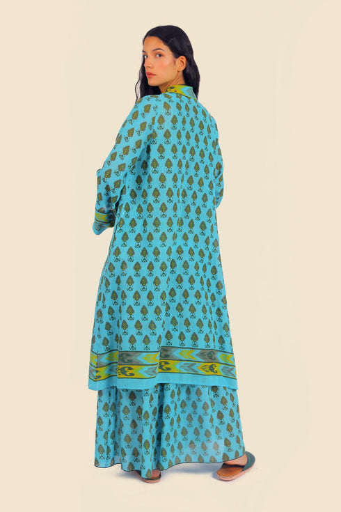 Coat in cotton gauze with asymmetric hemline